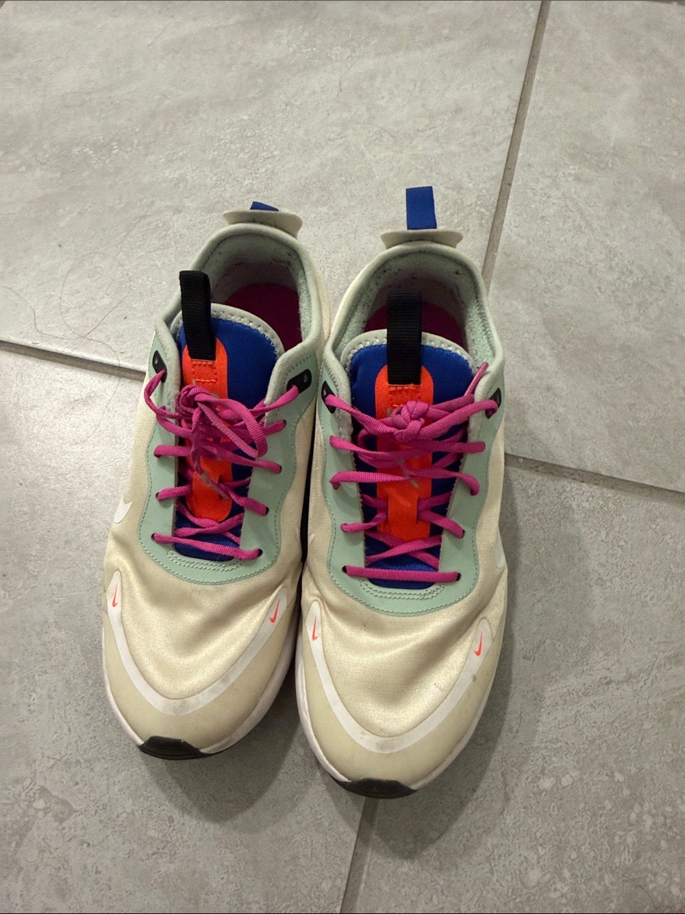 Nike Women’s Cream Sneakers with Pink Laces and Blue Accents